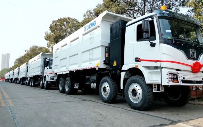 jbo竞博纯电动自卸车列队出海，助力当地煤炭运输绿色转型